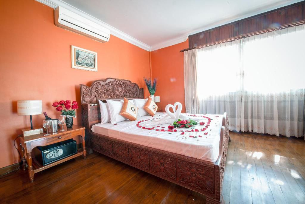 One-Bedroom Family Suite - Large Balcony with Garden View - Kitchen and Bathtub